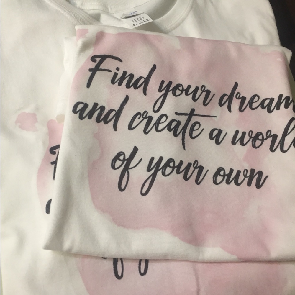 Logo shirts in white, yellow with quote